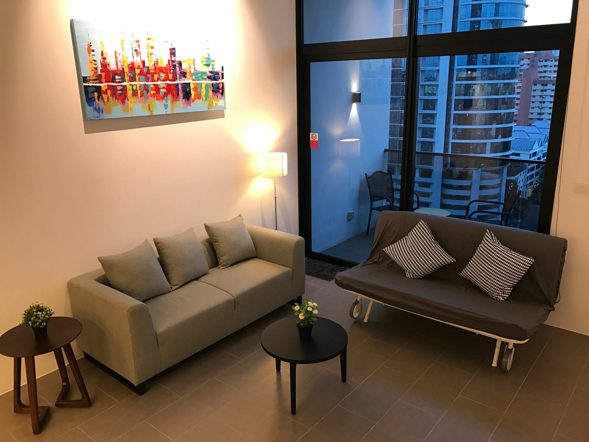 Alila Bangsar Kuala Lumpur Hotel Ngoại thất bức ảnh A living room with a sofa bed