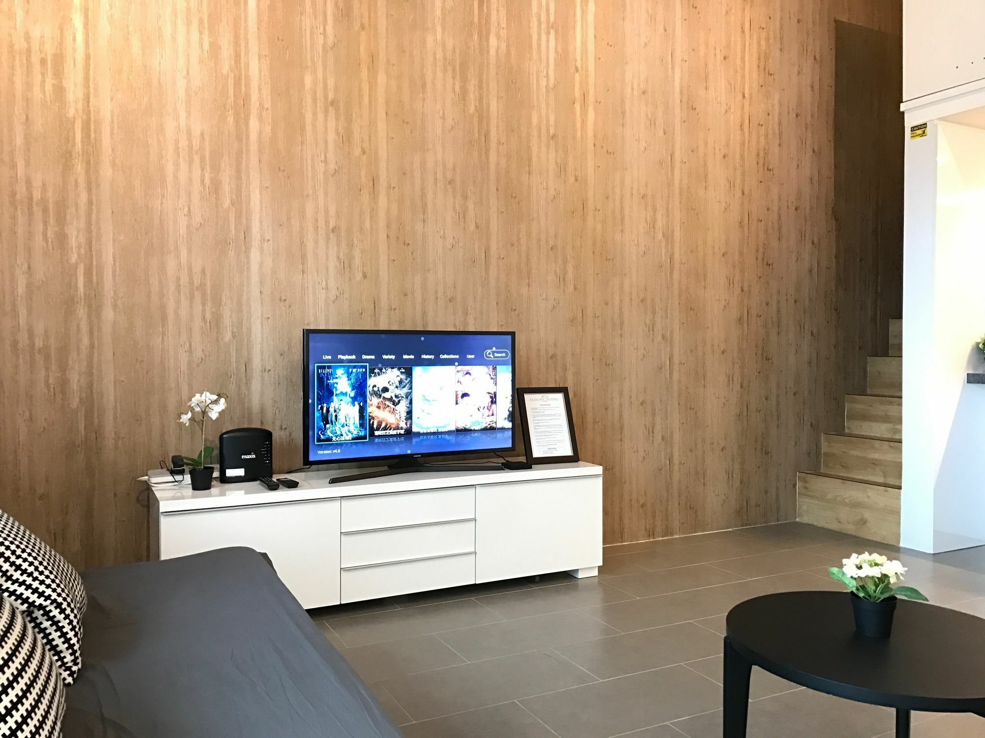 Alila Bangsar Kuala Lumpur Hotel Ngoại thất bức ảnh A living room with a television